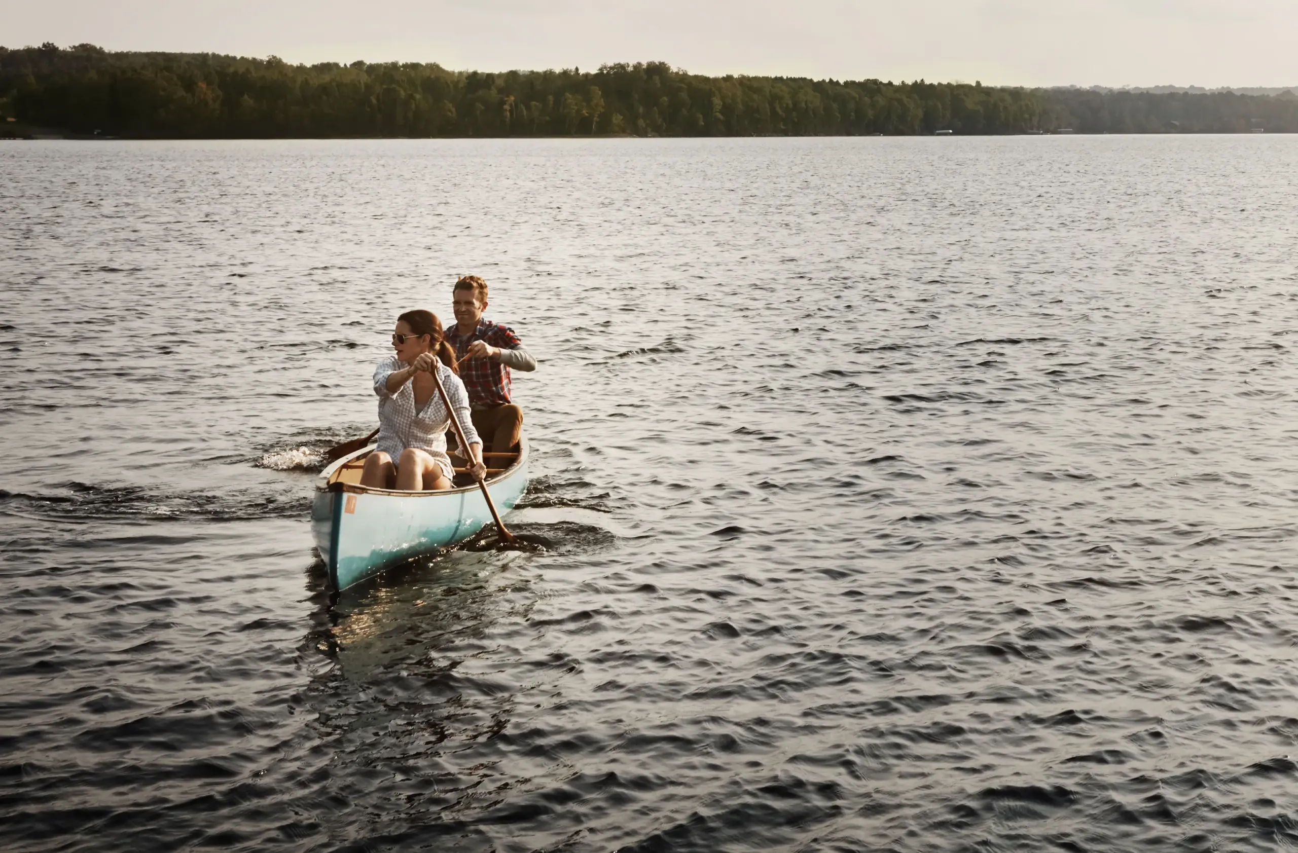HGH-Hormone-Clinic A couple takes a canoe out on a lake. Get HGH hormone therapy from David Garcia, D.O. in Nashville Metro.