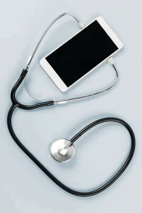 Telemedicine-Treatment A smartphone with a stethoscope attached to it, symbolizing Telemedicine treatment from David Garcia, D.O. in Nashville Metro.